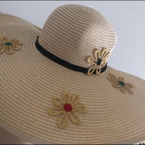 Beautifully embellished Straw hats.